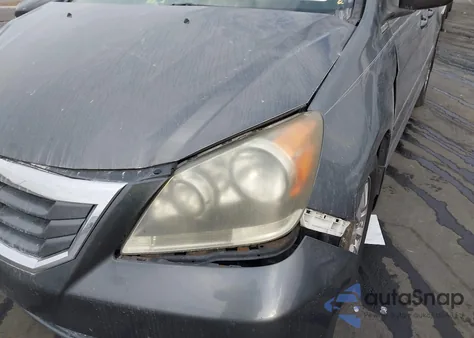 2010 Honda Odyssey Exl z USA, uszkodzony, nr VIN 5FNRL3H79AB114308